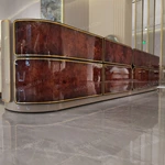 Luxury Bed End Cabinet with Natural Wood Veneer Drawer Fronts Upholstered Top and Stainless Steel Trim